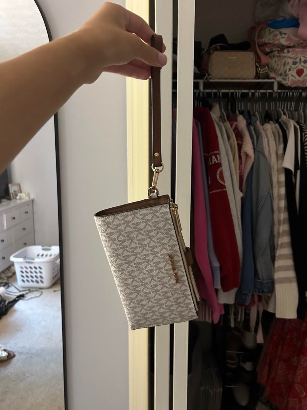 Michael Kors Cream Logo Pattern Wristlet with Brown Trim